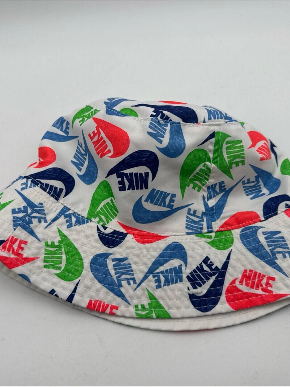 Nike Boys Reversible White AOP Bucket Hat - Size S/M